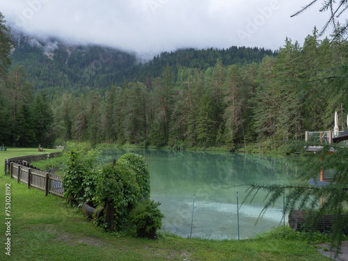 Creta Lake Nestled in the Greenery of the Fanes - Sennes - Braies Nature Park, Italy photo
