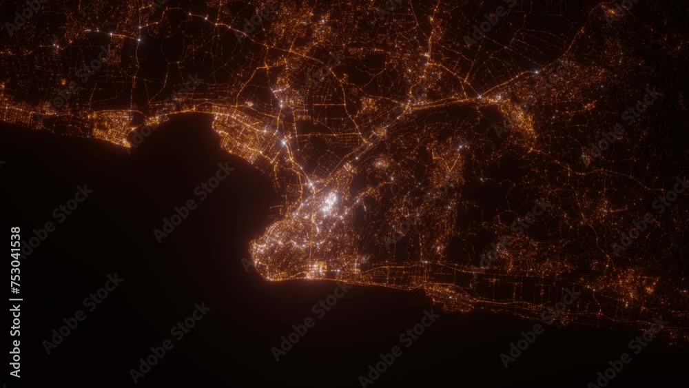 Haifa (Israel) top view at night. Aerial view on modern city from space. Camera is flying above the city, moving forward. Vertical video. The north is on the left side