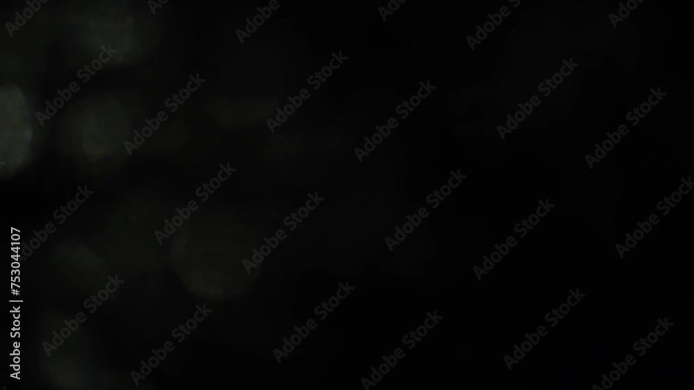 Bokeh of white lights, white glare of light from glass Bokeh of white lights, white glare of light from glass