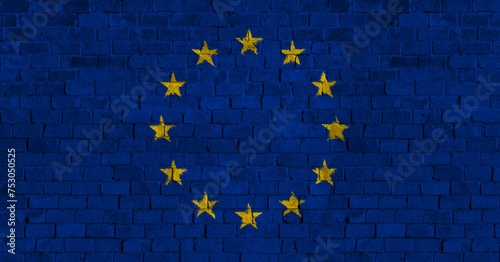 European Union Flag Over a Grunge Brick Background.