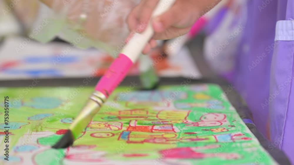 Children and friends paint with their own creativity in colorful colors in kindergarten class in school. Children paint water or crayons on drawing paper. Children and friends paint with their own creativity in colorful colors in kindergarten class in school. Children paint water or crayons on drawing paper.