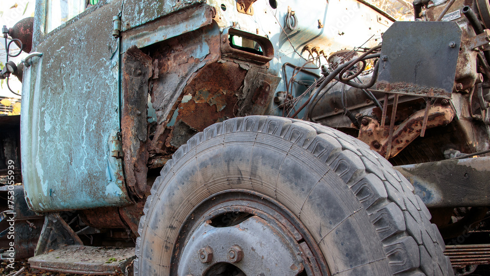 close-up of a disassembled Soviet-style car. the car body needs repair close-up of a disassembled Soviet-style car. the car body needs repair