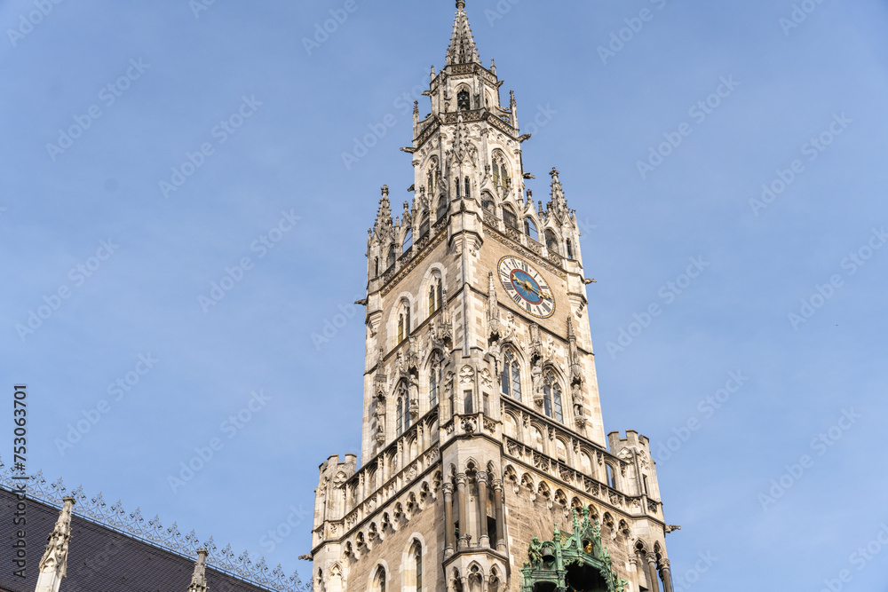 A tall clock tower with a clock on the side
