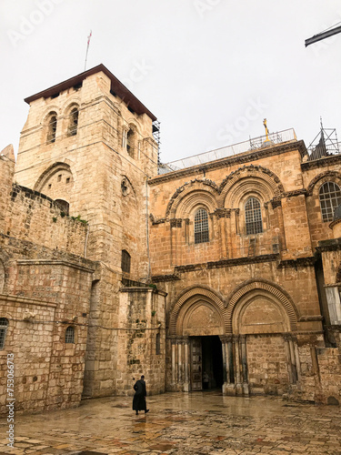 Entrance to the Church of the Holy Sepulcher (Latin: Ecclesia Sancti Sepulchri) on a rainy day photo