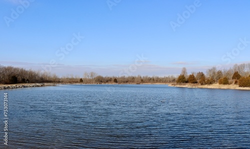 The peaceful pond in the countryside on a sunny day.