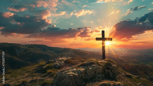 Cross on the hill - symbol of crucifixion of Jesus Christ. On beautiful sunset background. © Artlana