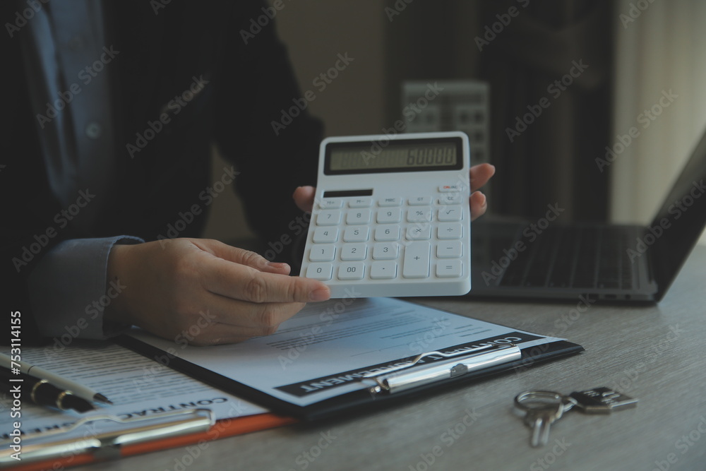 Real estate agent and customer signing contract to buy house, insurance or loan real estate.rent a house,get insurance or loan real estate or property. Real estate agent and customer signing contract to buy house, insurance or loan real estate.rent a house,get insurance or loan real estate or property.
