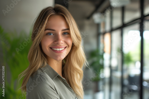 Free Download Portrait of smiling young businesswoman with blonde hair, Happy female employee, professional confident woman at modern office, Smiling business woman wallpaper concept, woman wearing blazer in office - GFXLoad