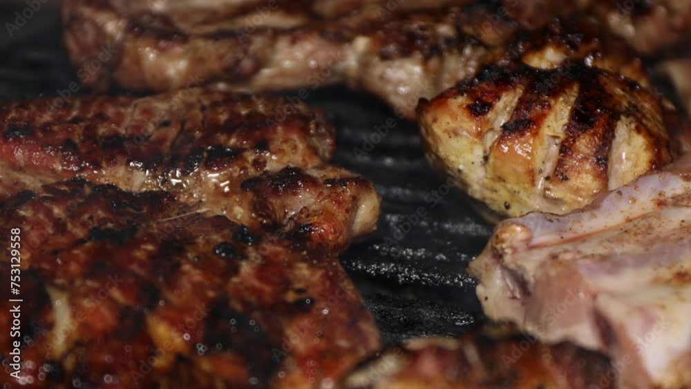 Charcoal Grilled Pork. Rising heat and smoke from roasting meat close-up. Charcoal Grilled Pork. Rising heat and smoke from roasting meat close-up.