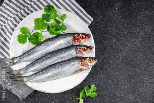 fish herring fresh raw seafood eating cooking meal food snack on the table copy space food background rustic top view 