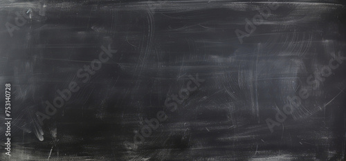 Black slate board wall with chalk stains with empty copy space for text