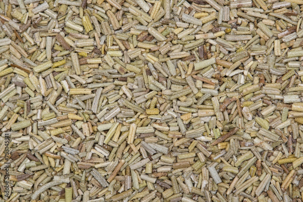 Crushed Rosemary herbs background image. Salvia rosmarinus aromatic herb used in many recipes and traditional folk medicine. Crushed Rosemary herbs background image. Salvia rosmarinus aromatic herb used in many recipes and traditional folk medicine.