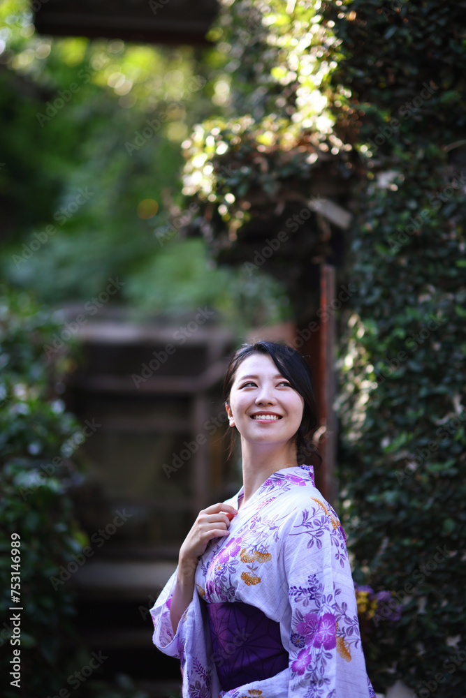 portrait woman with yukata dress in the garden portrait woman with yukata dress in the garden