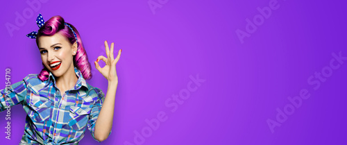 Pin up girl. Portrait photo of excited cheerful smiling red purple hair woman show ok okay zero cost hand sign gesture. Retro vintage ad concept. Isolated violet wall background. Wide banner image.