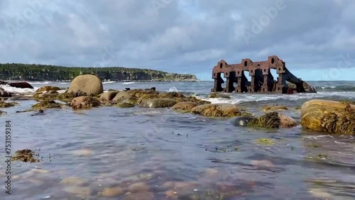 Wreck of the S.S. Ethie at Martin's Point is in Gros Morne National Park on The Viking Trail in Newfoundland, Canada. Rusty debris from 1919 shipwreck along a rocky shore.