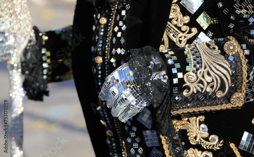 Detail of a Masked Man with Glove Made of Thousands of Micro Mirrors