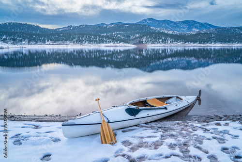 Fotografija after paddling scenery, expedition canoe on a shore of Carter Lake in northern C