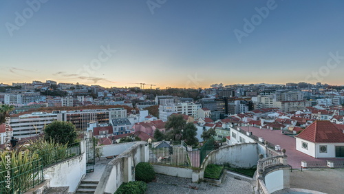 Tableau sur toile Panorama showing Jardim do Torel day to night timelapse with views to the city center of Lisbon after sunset