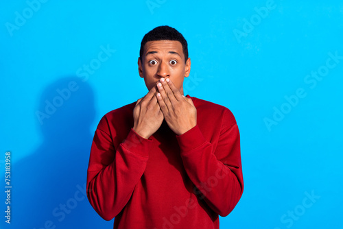 Vászonkép Portrait of speechless worried person arms palms cover mouth empty space isolate