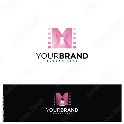 Elegant letter M with strip film and spot light for film production