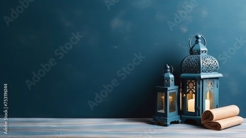 Traditional arabic cultural elements: lantern, quran, and misbaha arranged on blue wooden table - flat lay composition with copy space

