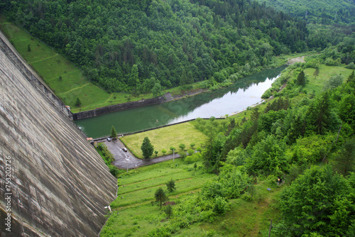 Beautiful landscape of Izvorul Muntelui lake at the hydroelectric dam in Transylvania. A view of Bicaz Dam in Romanian Carpathians, Europe photo