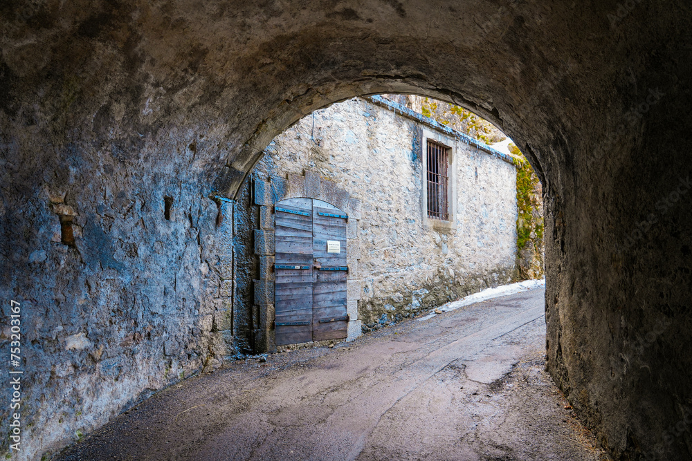 Vaulted passageway in the Fort du Château ("castle fortress") citadel built by Vauban on a hilltop above the town of Briançon in the mountains of the Hautes-Alpes department, France - obrazy, fototapety, plakaty 