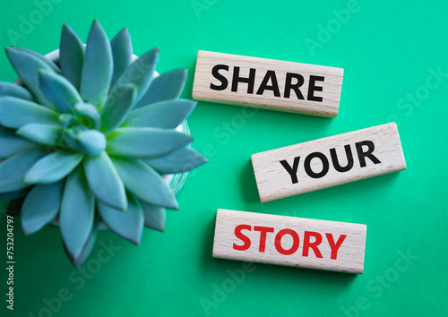 Share your story symbol. Wooden blocks with words Share your story. Beautiful green background. Business and Share your story concept. Copy space. photo