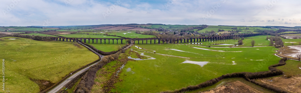 An aerial panorama view of the spectacular Harringworth Viaduct on a bright winter day