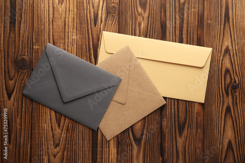 Creative layout of colored envelopes on wooden boards