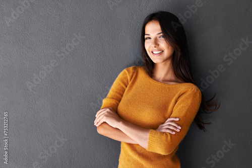 Portrait, mockup and Mexican woman in fashion with smile, clothes and sweater isolated on gray background. Female person, adult and model for casual outfit, stylish and fashionable by studio photo