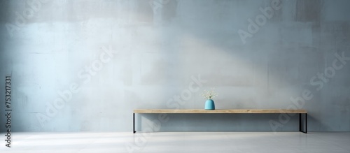 Pale blue finish on the smooth concrete wall