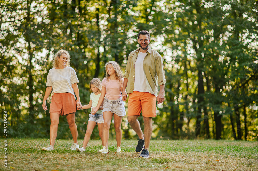 An affectionate family spending day together in nature. An affectionate family spending day together in nature.