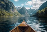 Canoe on Lake With Mountains