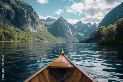 Canoe on Lake With Mountains