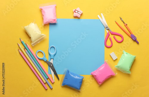 Many different products for children's creativity on a yellow background.