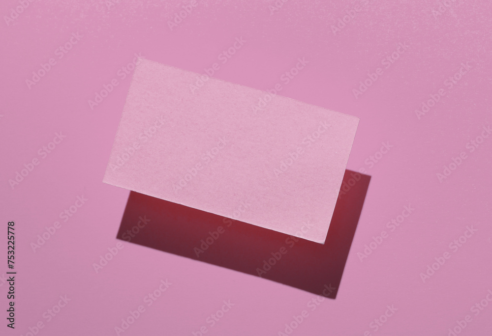 Pink Blank business card for corporate identity on pink background. Creative mockup. Pink Blank business card for corporate identity on pink background. Creative mockup.