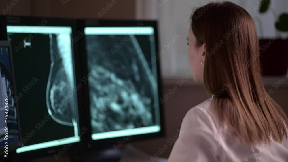 The doctor looks at the results of a computed tomography scan. The doctor examines the patient's MRI and looks for an oncological diagnosis The doctor looks at the results of a computed tomography scan. The doctor examines the patient's MRI and looks for an oncological diagnosis