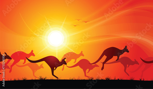 kangaroos hopping across desert sunset