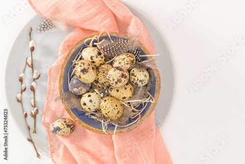 Quail eggs in a ceramic bowl