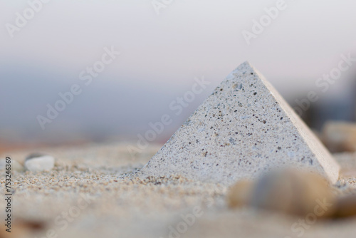 Stage with concrete and sand pyramid