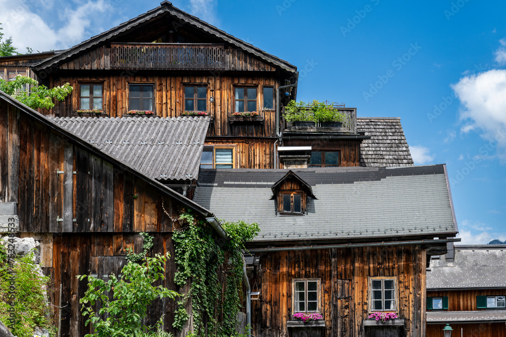 Wooden houses in historic village Hallstatt in Austrian Alps. Wooden houses in historic village Hallstatt in Austrian Alps.