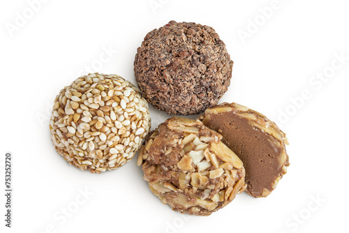 A variety of different truffles Isolated on a white background. Top view. Flat lay.