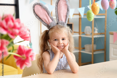 Adorable little girl with b...