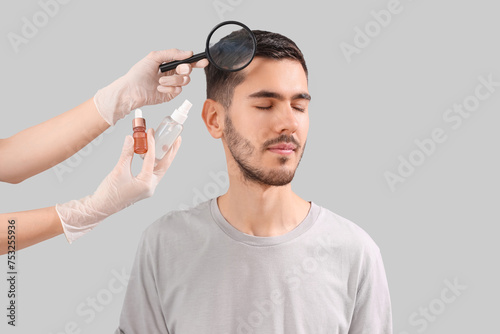 Doctor with products for ha...
