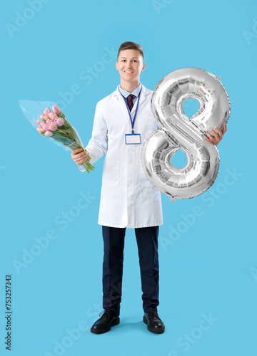 Male doctor with tulips and...