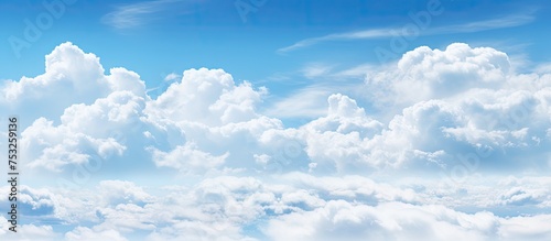 Majestic Aircraft Soaring Above Fluffy Cumulus Clouds in a Spectacular Aerial Journey