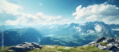Vibrant Mountain Landscape with Lush Grass Field and Scattered Rocks