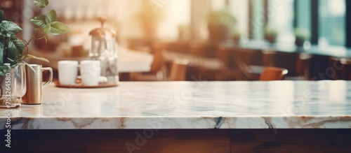 Blurred kitchen cafe restaurant interior with marble table top