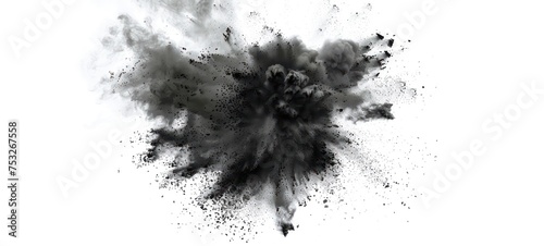 Black powder explosion isolated on white background, charcoal like particles concept.